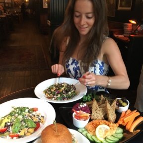 Jackie eating food at Flatiron Hall